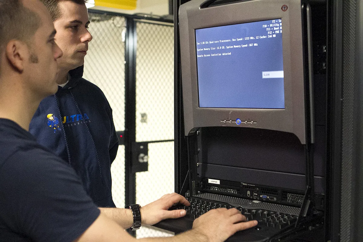 Two Ultra engineers at a server console in our own datacenter